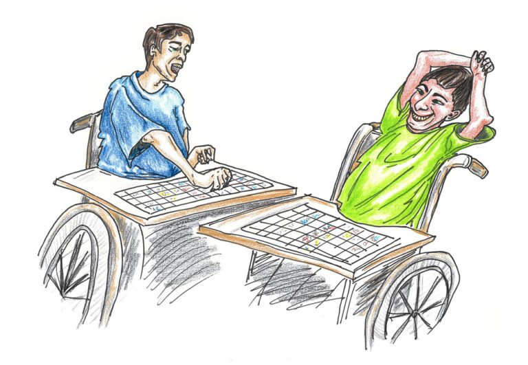 boys chatting using communication boards