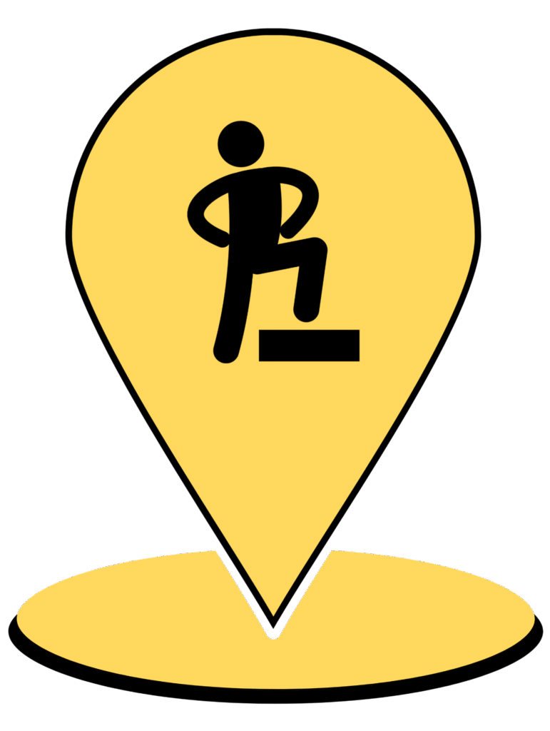 A yellow map pin with a person placing their foot and leg on top of a podium featured in the middle. ASC for AAC.
